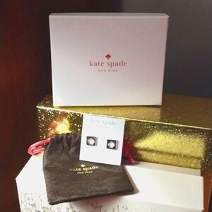 Kate Spade silver hole punch Spade earrings with bag and box NEW WITH TAGS!